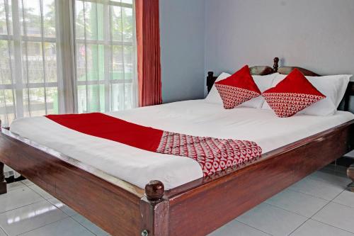 Giường trong phòng chung tại SPOT ON 91214 Desa Wisata Pandean
