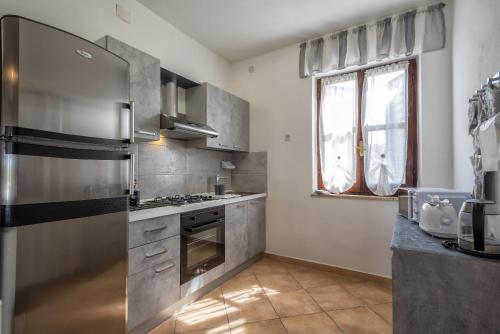 Kuchyň nebo kuchyňský kout v ubytování Casa Vacanza da Albino