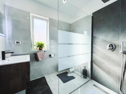 Kylpyhuone majoituspaikassa Premium Cocaletto Apartment Rovinj