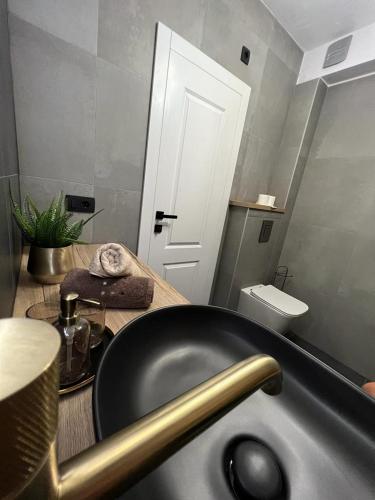 Um banheiro em CUBE Residence