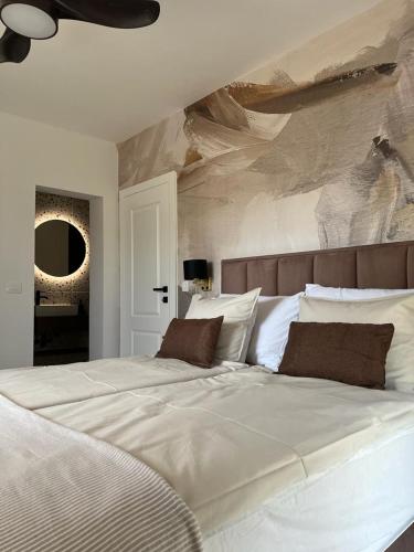 Cama ou camas em um quarto em CUBE Residence