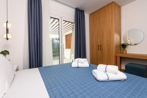 Postel nebo postele na pokoji v ubytování Hotel Aethria
