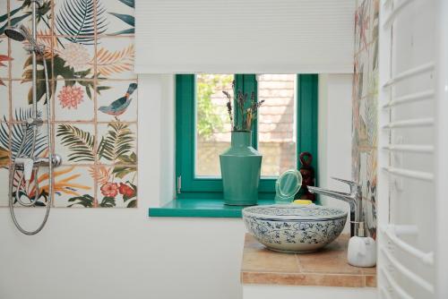 A bathroom at Angel Holiday Mansion