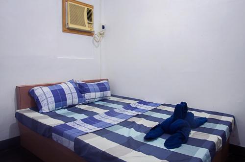 Postel nebo postele na pokoji v ubytování Providence Travellers Inn & Spa