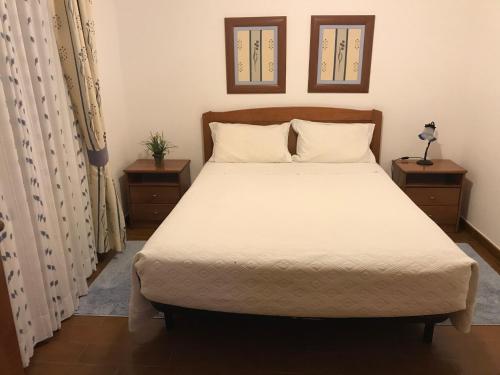 Postel nebo postele na pokoji v ubytování Casinha Rio Azul