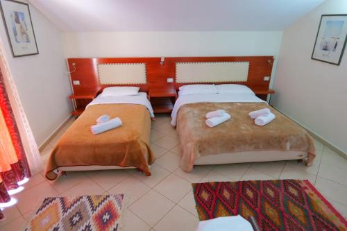 Cama o camas de una habitación en Hotel Veli