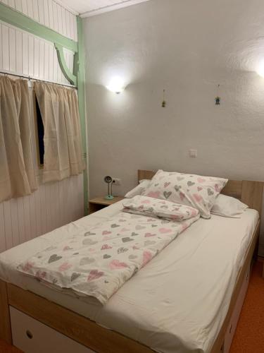 Letto o letti in una camera di The 1882 Old House Vodnikova