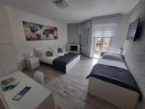Una cama o camas en una habitación de GUEST HOUSE TRA CIELO E MARE