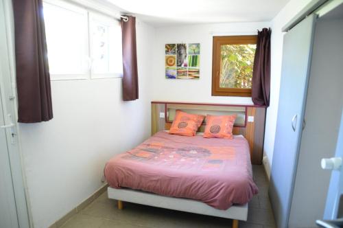Postel nebo postele na pokoji v ubytování Le Jardin de Sasha
