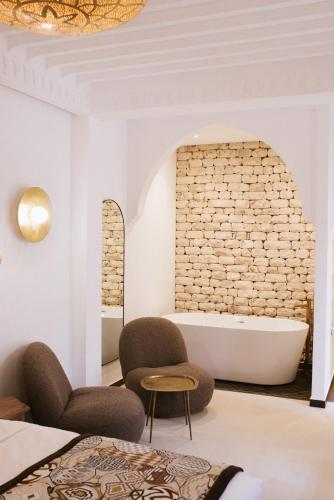 Letto o letti in una camera di Riad Nyla Wellness and Spa