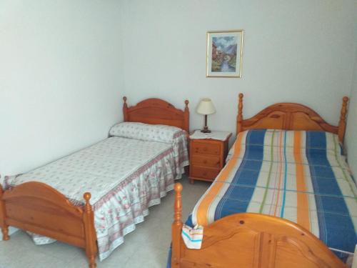 Una cama o camas en una habitación de Room in Chalet - Habitacion En Chalet Compartido En Toledo