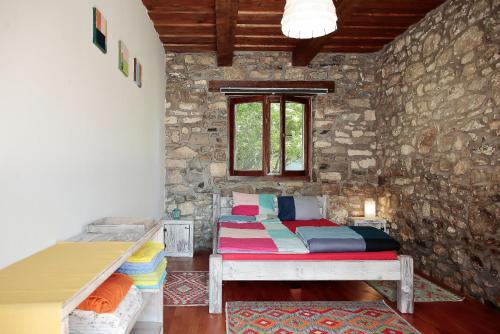 Postel nebo postele na pokoji v ubytování Angel Village