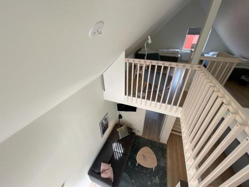 an overhead view of a staircase in a house at Rocklunda Village in Västerås
