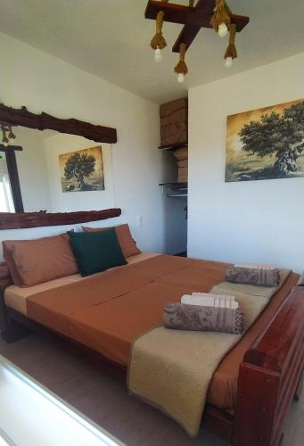 Tempat tidur dalam kamar di MyParadise-Farm Villa in the centre of South Crete