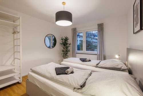 Katil atau katil-katil dalam bilik di Glück Auf Appartements Walter-Hohmann-Straße Essen