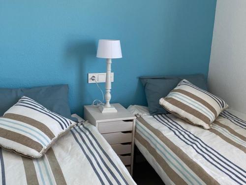 Ένα ή περισσότερα κρεβάτια σε δωμάτιο στο Apartamentos Stil Mar Anna - Stil Port Mar Anna