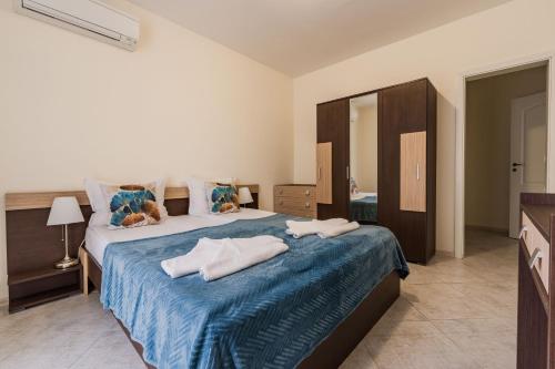Ліжко або ліжка в номері ApartComplex Splendid