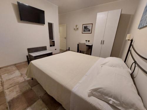 Letto o letti in una camera di Casa Petra