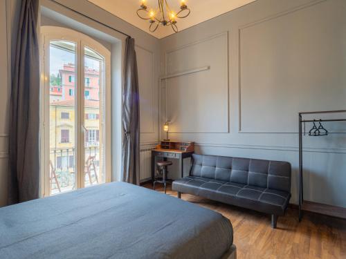 Postel nebo postele na pokoji v ubytování L'Opera Rooms & Suite