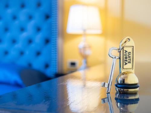 a small toy on top of a table at L'Opera Rooms & Suite in La Spezia
