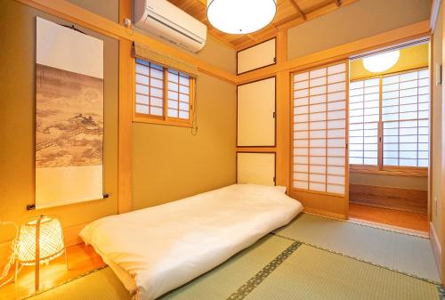 Lova arba lovos apgyvendinimo įstaigoje Japanese traditional house.Ryokan in asakusa with 2bedrooms