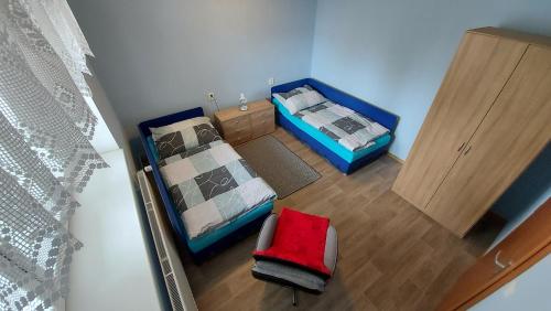 Postel nebo postele na pokoji v ubytování Apartmán Jaruška