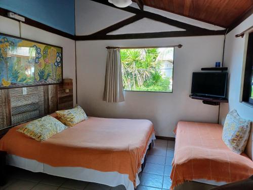 Un pat sau paturi într-o cameră la Shanti House Apart