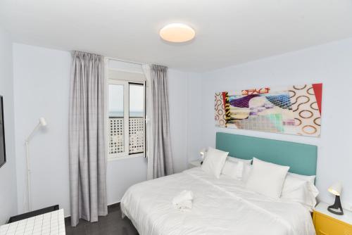 Postel nebo postele na pokoji v ubytování Hotel Kuve Marbella