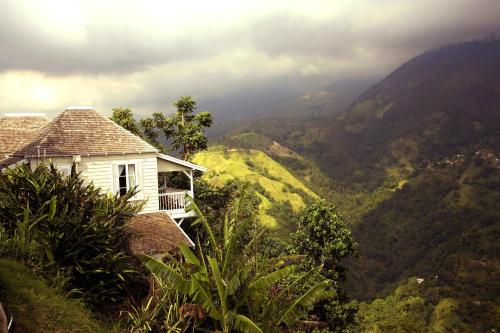 a house on a hill with a view of a valley at Strawberry Hill in Newcastle