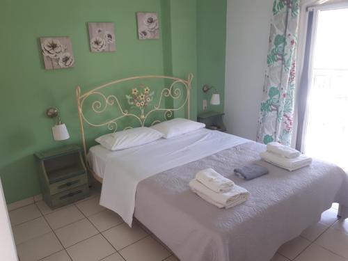 Katil atau katil-katil dalam bilik di Fofos Rooms