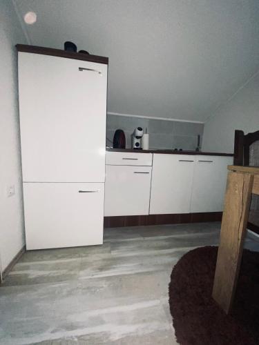 Kuchyň nebo kuchyňský kout v ubytování Apartman FILIP