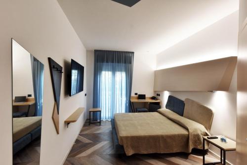 Postel nebo postele na pokoji v ubytování Color Hotel Rimini
