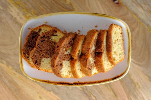 a loaf of bread in a bowl on a table at Acro Blue Luxury Villas in Akrotiri
