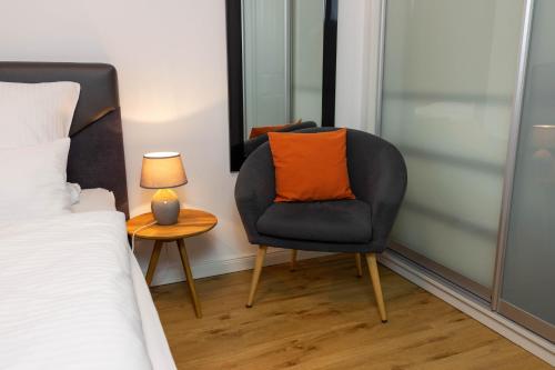 Postel nebo postele na pokoji v ubytování Heideträume Appartements