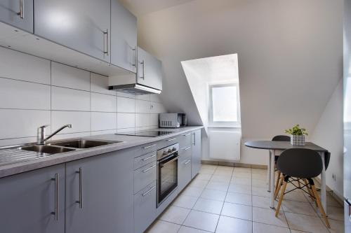 Kuchyňa alebo kuchynka v ubytovaní Appartement 37 m² moderne proche tramway - 2 min