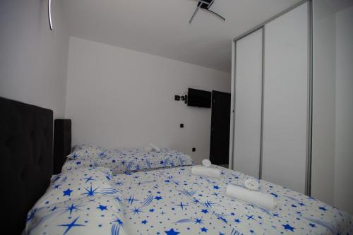 Katil atau katil-katil dalam bilik di Apartmani JaMi