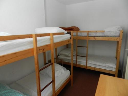 Ένα ή περισσότερα κρεβάτια σε δωμάτιο στο Appartement 2 pièces cabine, proche des pistes, Le Pleynet - FR-1-557A-5