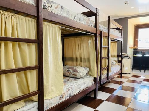Krevet ili kreveti u jedinici u okviru objekta Le Rêve city hostel