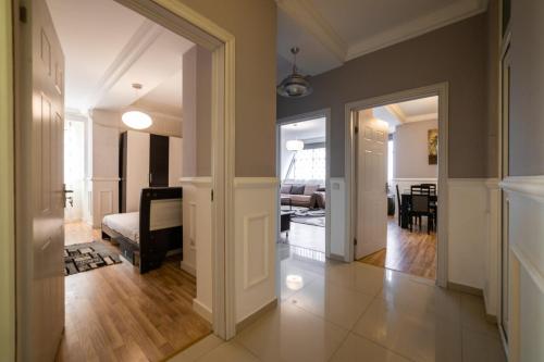a view of a living room from the hallway at CedarTREE Prishtina in Prishtinë