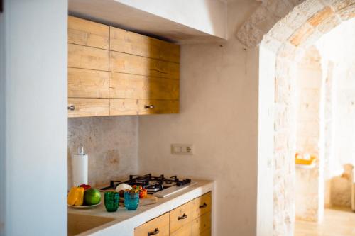 Una cocina o zona de cocina en Trulli Ad Maiora
