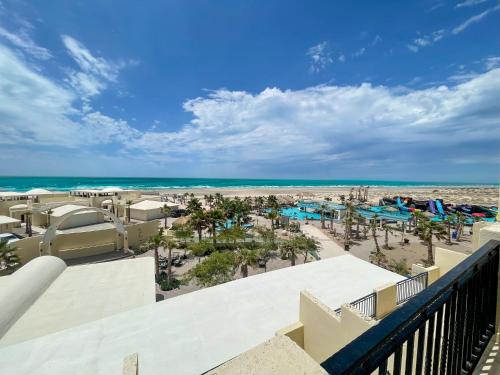 Gorgeous Beachfront Gem with Water Slides – Photos 2