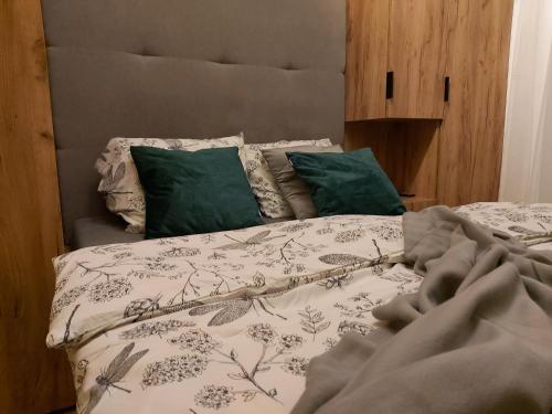 Ein Bett oder Betten in einem Zimmer der Unterkunft Apartament 24