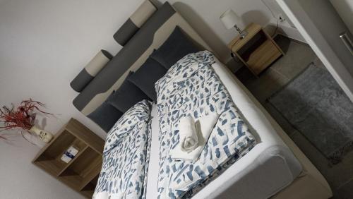 a bed in a room with at Elita Prenoćište in Bihać
