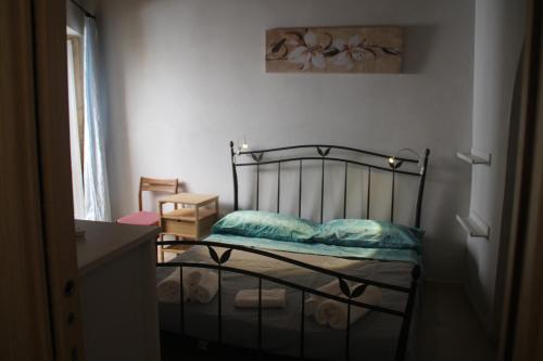Postel nebo postele na pokoji v ubytování Casa dei Cocci