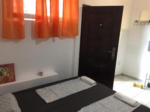 a bedroom with a bed and an open door at Stadion in Belgrade