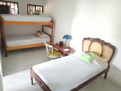 Postel nebo postele na pokoji v ubytování MISS LUCY