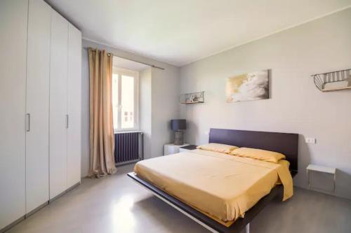 A bed or beds in a room at La Fabbrica dei Sogni