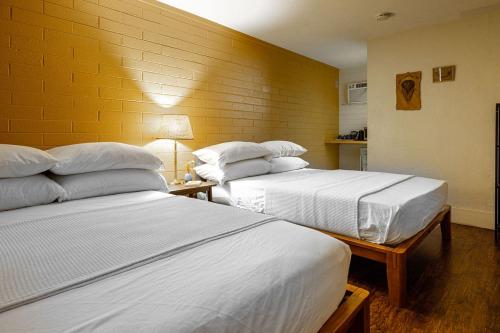 Кровать или кровати в номере Star Motel