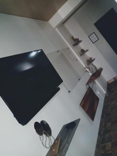 Televisyen dan/atau pusat hiburan di Consulado Americano a pocos minutos D1