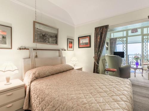 Ένα ή περισσότερα κρεβάτια σε δωμάτιο στο Clooneavin Apartment 4